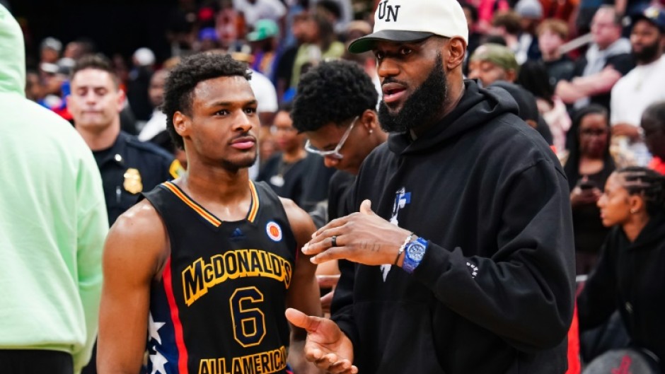 Bronny James (left), the son of NBA star LeBron James (right), suffered a cardiac arrest while practicing with his college team