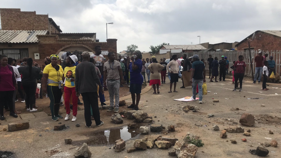 Community members demonstrating in Naledi, Soweto over service delivery issues.
