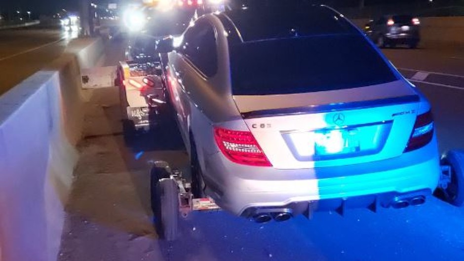 The driver, accompanied by another man his age, was driving his father's Mercedes late Saturday night on the Queen Elizabeth Way highway.
