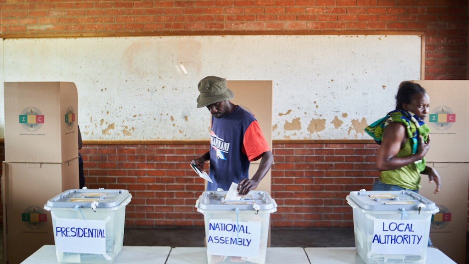 A man casts his vote at a polling station during Zimbabwe's presidential and legislative elections. AFP/Zinyange Auntony