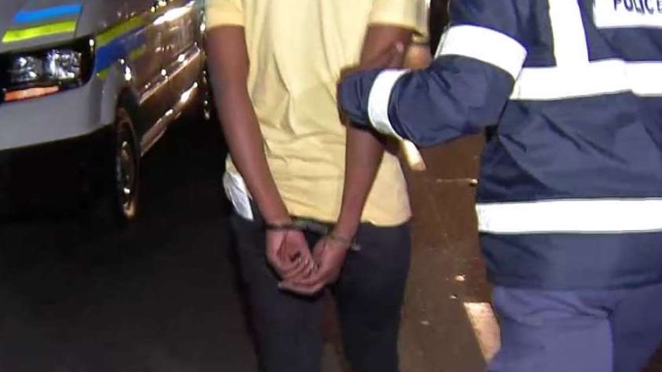 Police arrest a suspect.