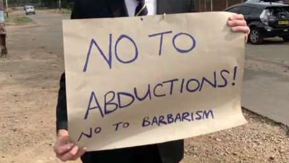 A sign made by human rights lawyer Douglas Coltart. 