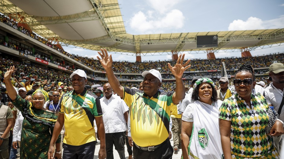 South African President and president of the African National Congress (ANC) Cyril Ramaphosa (C) and Deputy President of South Africa and the ANC Paul Mashatile (2nd L) arrive at the 112th ANC Anniversary rally in Mbombela on January 13, 2024. 