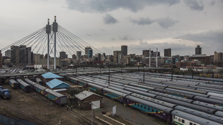 File: An aerial view in Johannesburg shows the Mandela bridge in Braamfontein and the Park Station train depot.