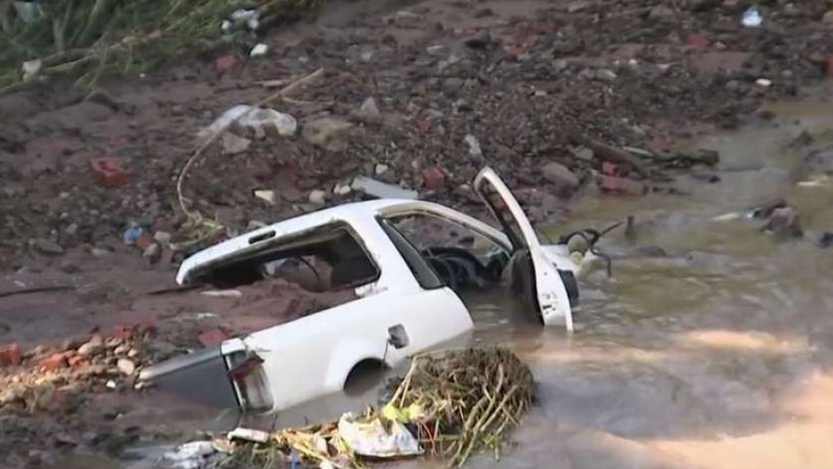 A vehicle that was swept away by the floods.