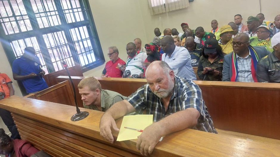 Pieter Groenewald and his son Stephan at the Groblersdal magistrate's court. eNCA/Hloni Mtimkulu