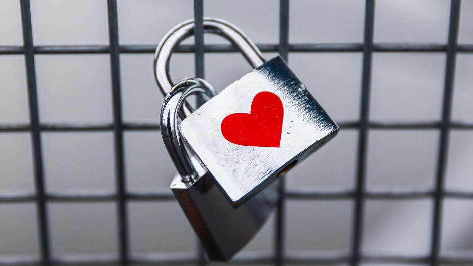 A love padlock is seen at Father Bernatek Footbridge over Vistula River, which is known as the lovers bridge. Krakow, Poland on February 13, 2023. (Photo by Beata Zawrzel/NurPhoto) (Photo by Beata Zawrzel / NurPhoto / NurPhoto via AFP)