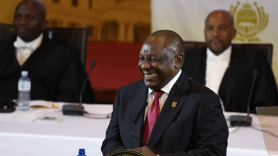 South African President Cyril Ramaphosa reacts as he delivers the state of the nation address at the City Hall in Cape Town on February 8, 2024.