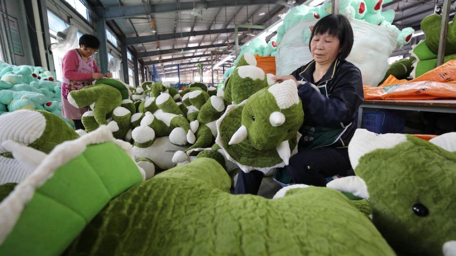 File: Chinese workers make soft toys to be exported to the United States and Europe. Imaginechina via AFP/Si wei