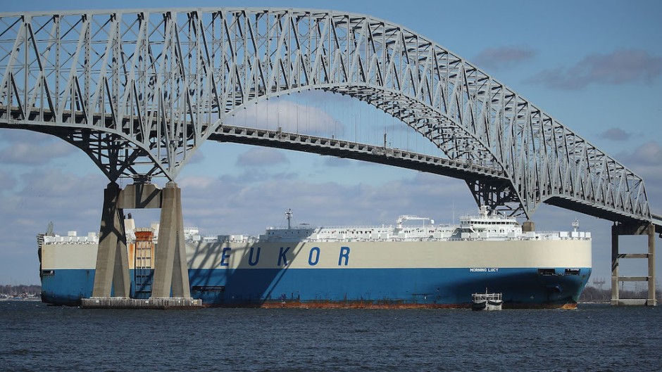 File: An outbound cargo ship passes under the Francis Scott Key Bridge in Baltimore. AFP/Mark Wilson/Getty Images
