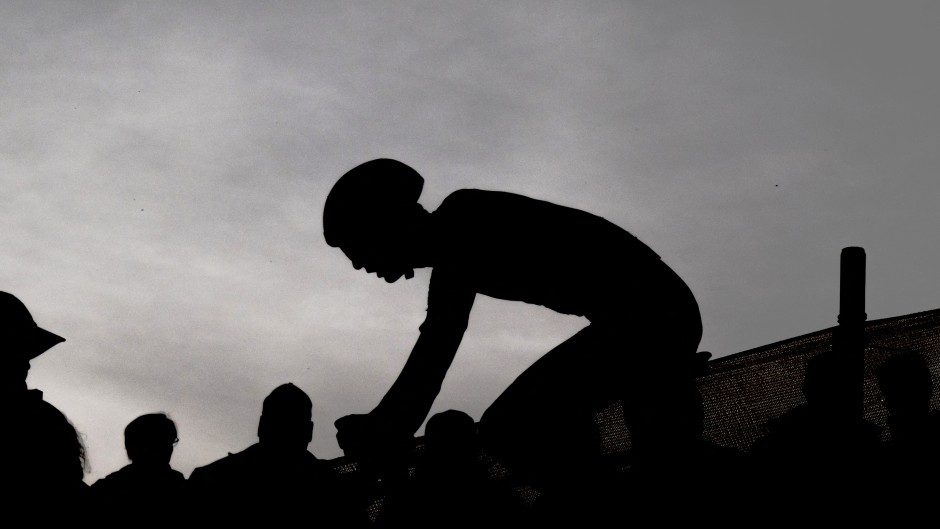 File: A Cyclist on his bike.
