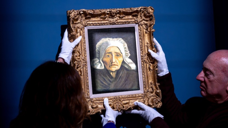 The Van Gogh titled "Tete de paysanne a la coiffe blanche". AFP/Nick Gammon