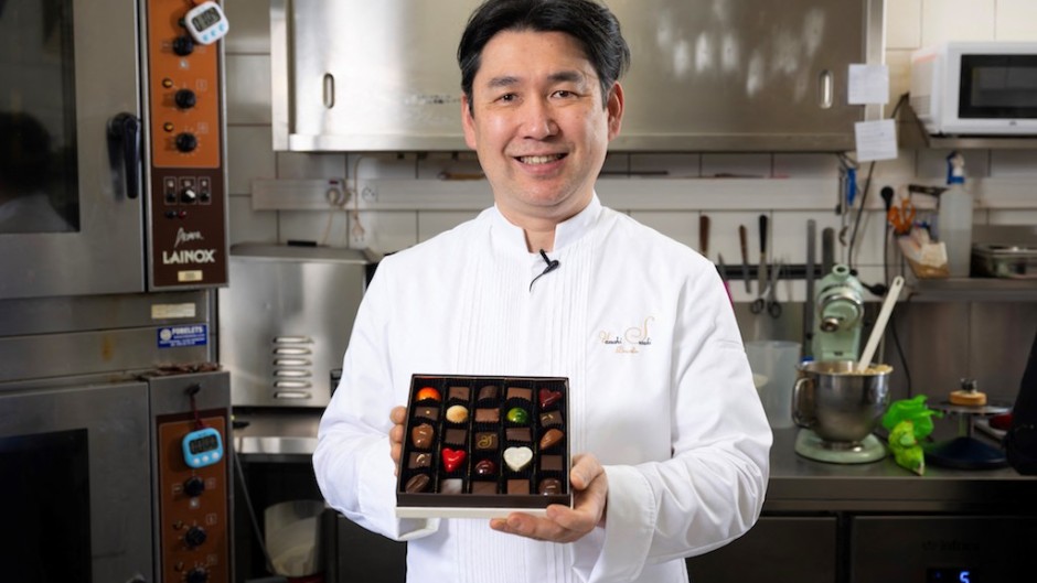 apanese chocolatier Yasushi Sasaki holds a box of chocolates. AFP/John Thys