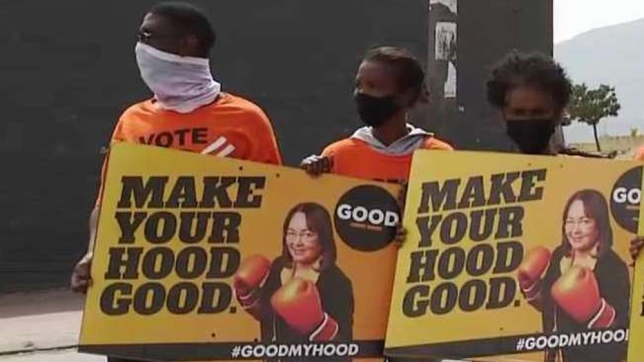 GOOD supporters with placards.