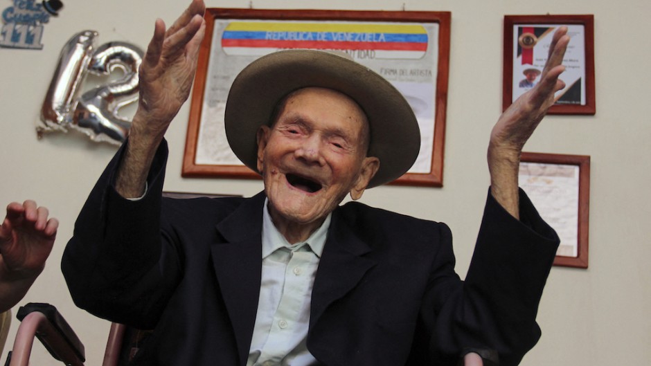 Juan Vicente Pérez gestures at his home in San Jose de Bolivar. AFP/Jhonny Parra
