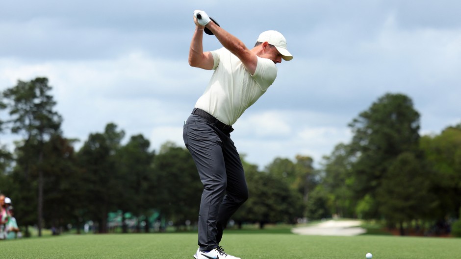 Rory McIlroy of Northern Ireland plays his shot from the first tee during a practice round prior to the 2024 Masters Tournament at Augusta National Golf Club on April 10, 2024 in Augusta, Georgia.