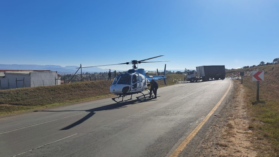 A police helicopter on the ground.