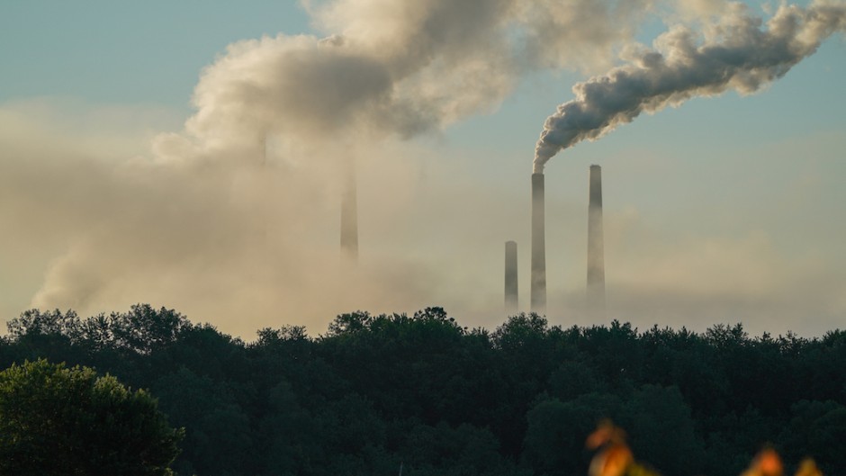 File: Pollution spewing from the stacks of a power plant. Jason Whitman/NurPhoto via AFP