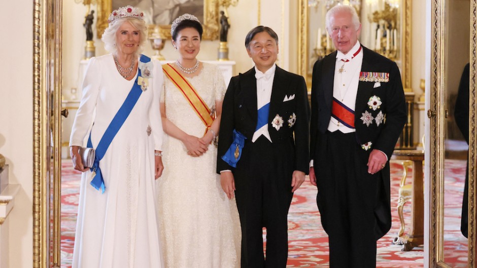 Britain's King Charles III, Japanese Emperor Naruhito, Empress Masako, and Britain's Queen Camilla pose for cameras before the banquet. AFP/Pool