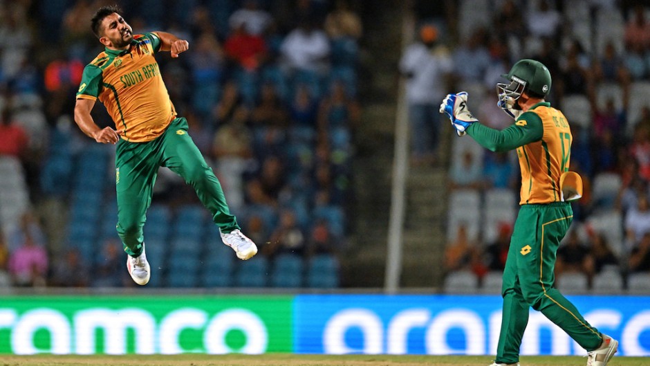 Tabraiz Shamsi (L) celebrates after the dismissal of Afghanistan's Karim Janat (out of frame) during the ICC men's Twenty20 World Cup 2024 semi-final cricket match between South Africa and Afghanistan. AFP/Chandan Khanna