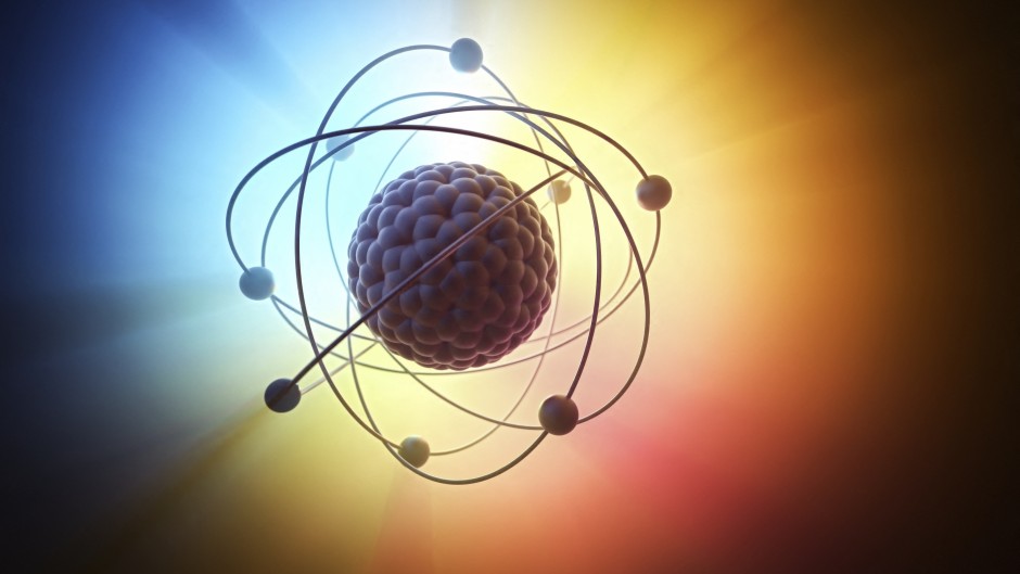 File: Nuclear power, nuclear reaction or nuclear energy, generating heat in a concept image of a nuclear atomic model.
