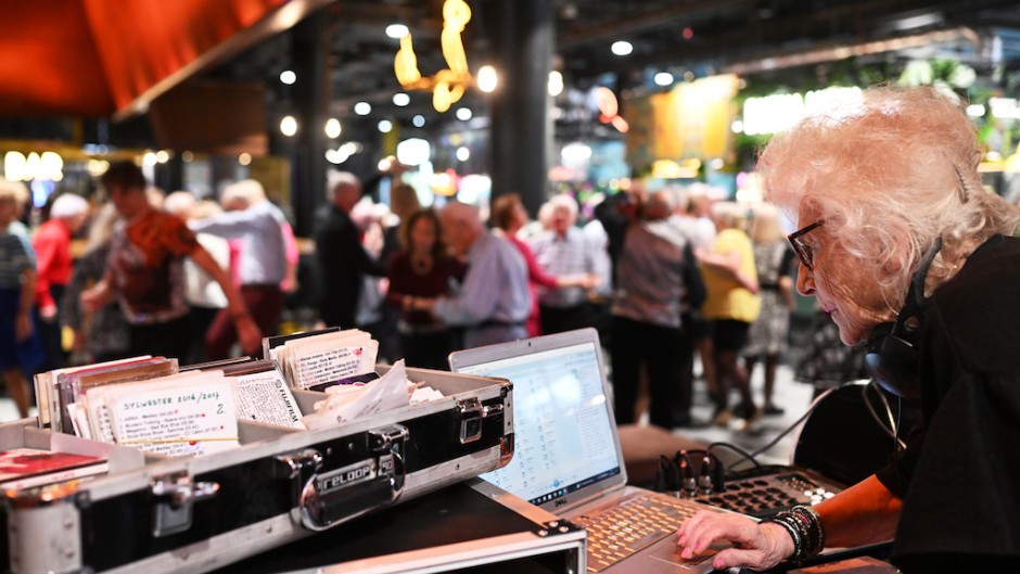 DJ Wika performs for seniors at the shopping centre in Warsaw. AFP/Sergei Gapon