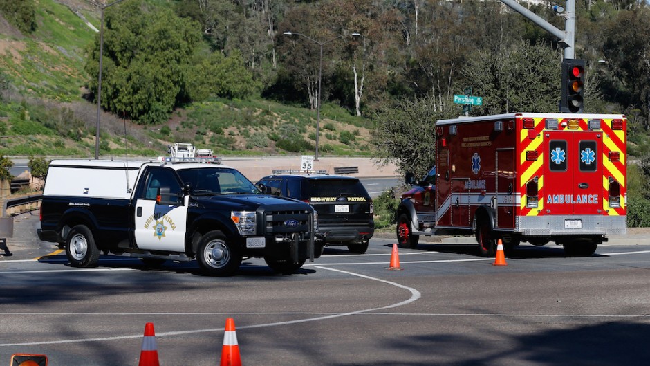 File: California Highway Patrol officers control traffic. Sean M. Haffey/Getty Images via AFP