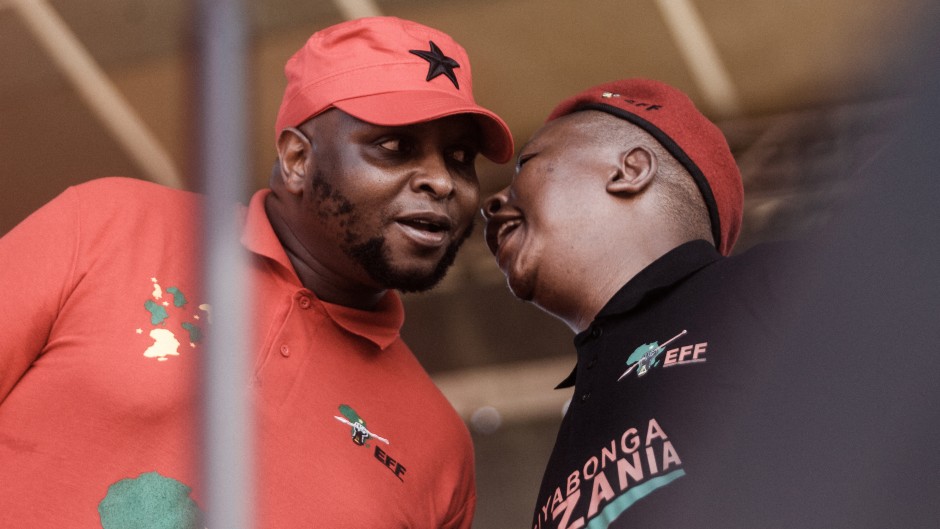 File: Economic Freedom Fighters (EFF) leader Julius Malema (R) talks with EFF Deputy President Floyd Shivambu.