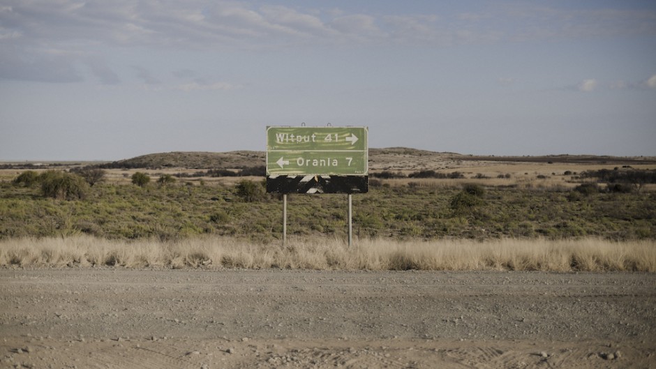 A signpost shows the direction to Orania. AFP/Marco Longari