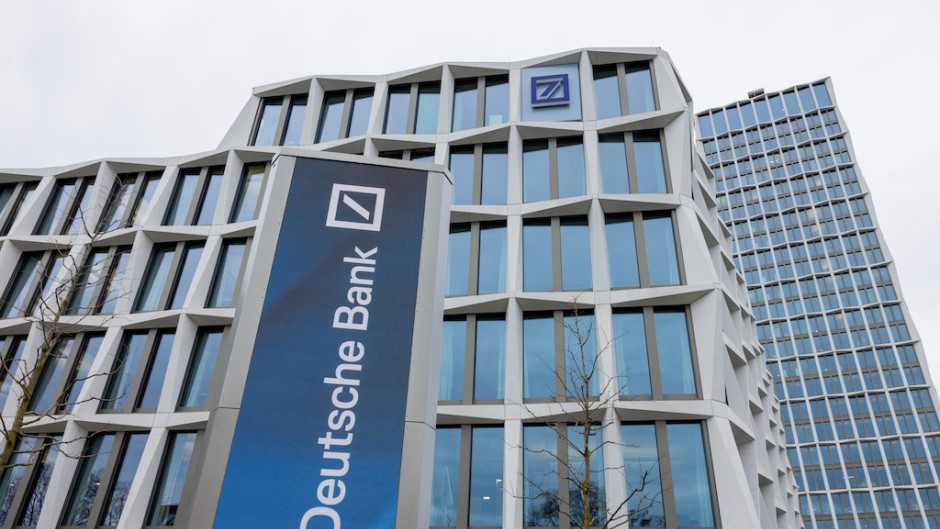 View of the Postbank headquarters with the Deutsche Bank logo. Rolf Vennenbernd/dpa Picture-Alliance via AFP