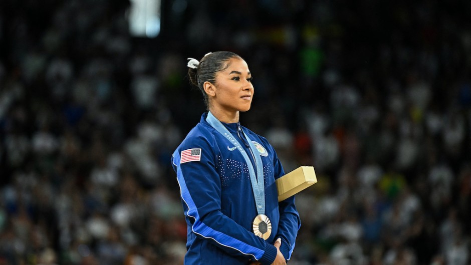 Jordan Chiles poses during the podium ceremony for the artistic gymnastics women's floor exercise event. AFP/Gabriel Bouys