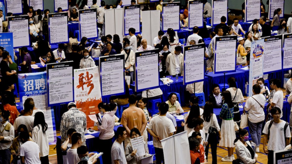 people attending a job fair in Huai'an, in eastern China's Jiangsu province. AFP/China Out.jpg