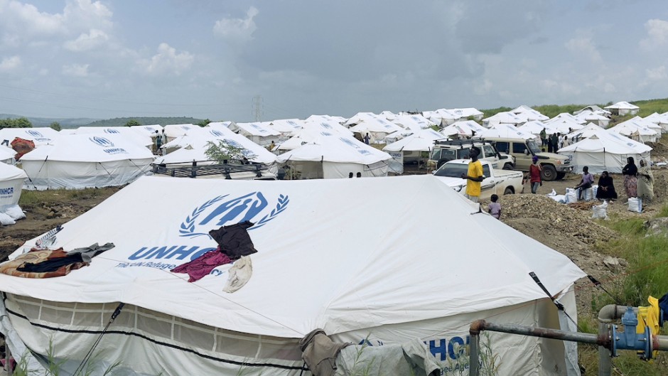 Displaced Sudanese who have returned from Ethiopia gather in a camp run by the United Nations Refugee Agency. AFP