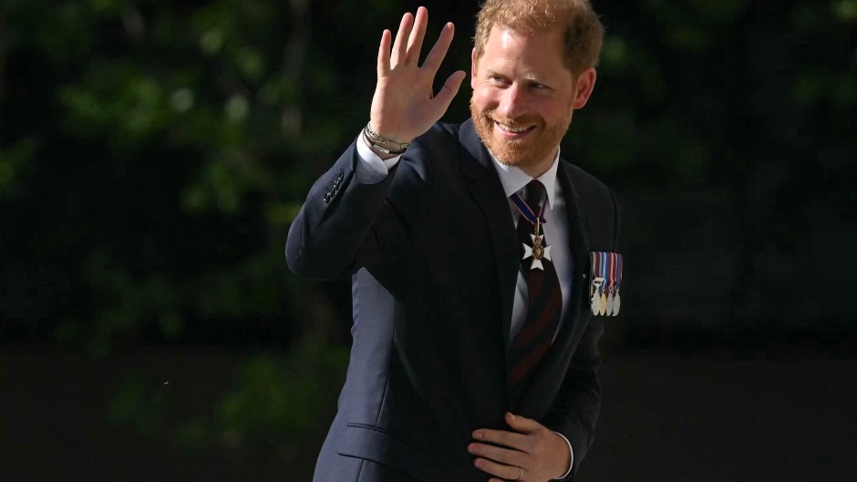 Britain's Prince Harry, Duke of Sussex waves as he arrives to attend a ceremony marking the 10th anniversary of the Invictus Games. AFP/Justin Tallis
