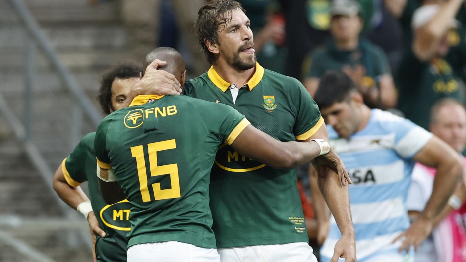Aphelele Fassi celebrates after scoring the team's third try with Eben Etzebeth. AFP/Phill Magakoe