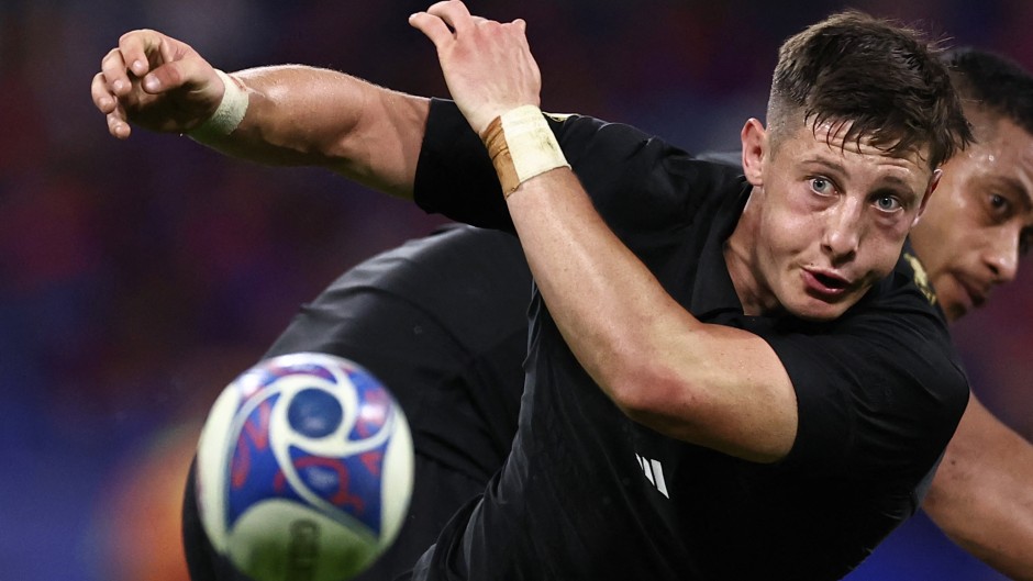 New Zealand's scrum-half Cam Roigard passes the ball out of a scrum. AFP/Anne-Christine Poujoulat
