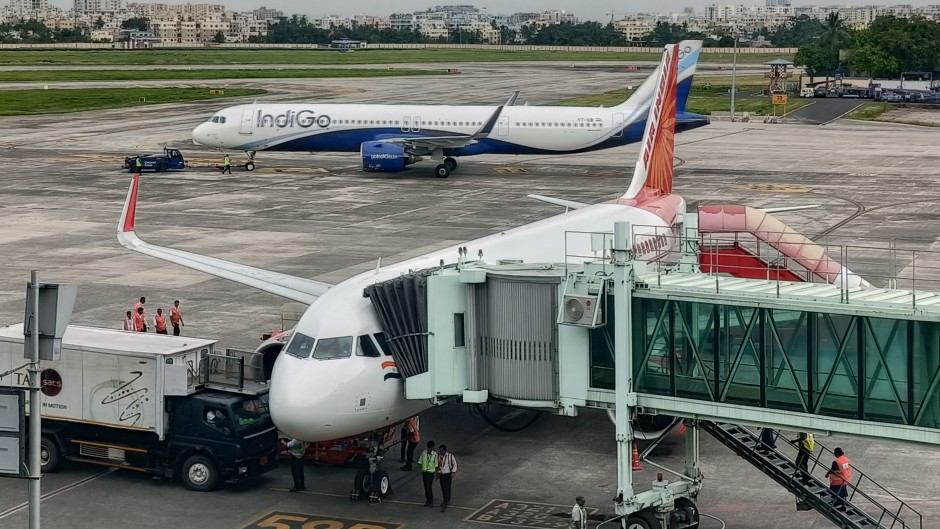 An Air India and IndiGo Airlines airplane is on the runway at Netaji Subash Chandra Bose International Airport in Kolkata. Debajyoti Chakraborty/NurPhoto via AFP