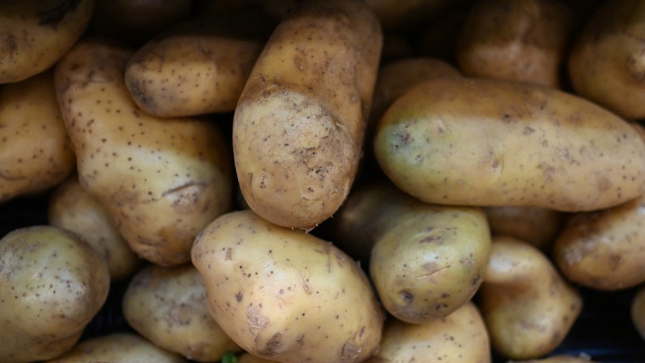 Potatoes seen at a grocery store. AFP