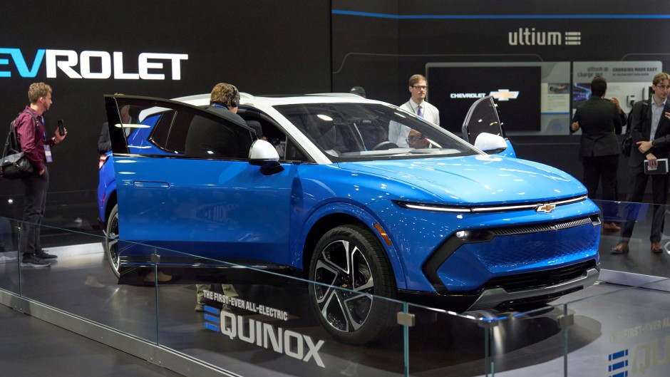 the Chevy Equinox EV at the North American International Auto Show in Detroit. AFP/Geoff Robins