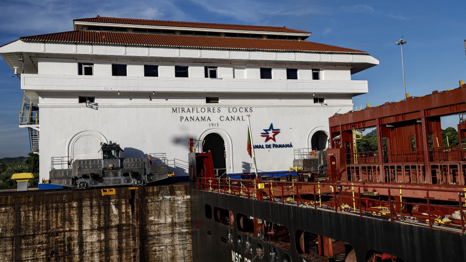 A cargo ship passes through the Miraflores locks on the Panama Canal in Panama City. AFP/Martin Bernetti