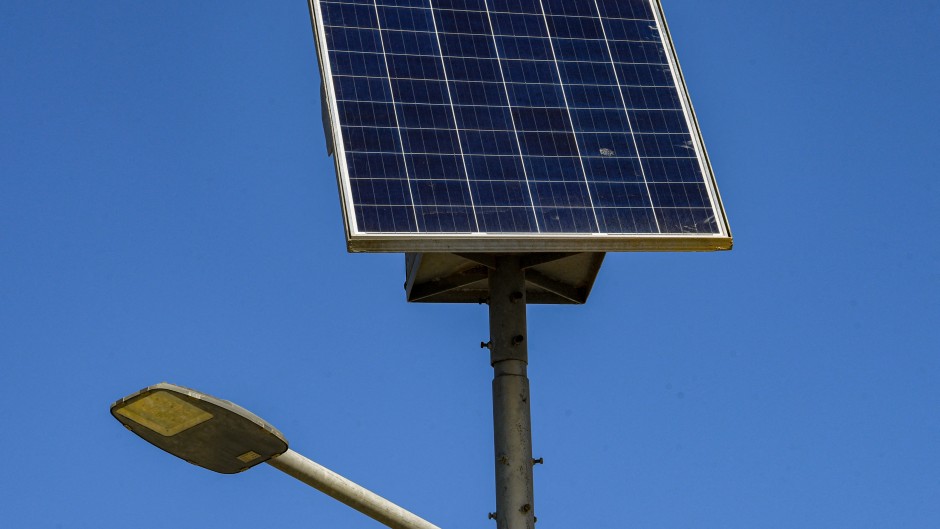 Solar panels used to power road lights. AFP/Fethi Belaid