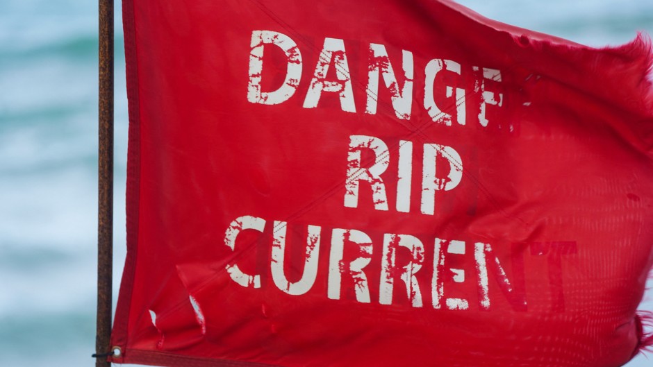 File: A red flag, indicating unsafe swimming conditions and warning for rip current, is seen on a beach. AFP/Jaydee Lee Serrano