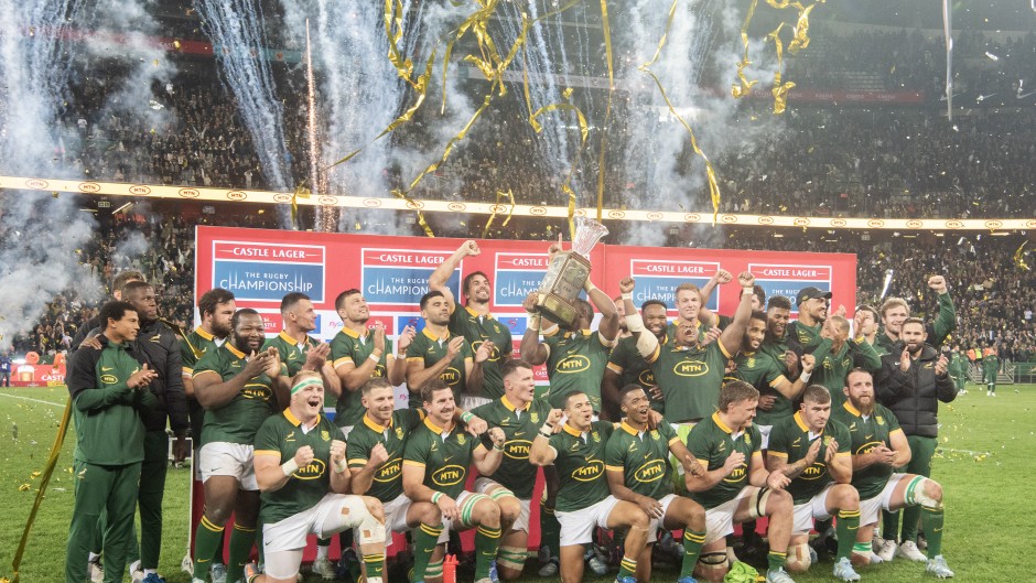 Springbok rugby team celebrates after defeating New Zealand at the end of the Rugby Championship Test match. AFP/Rodger Bosch