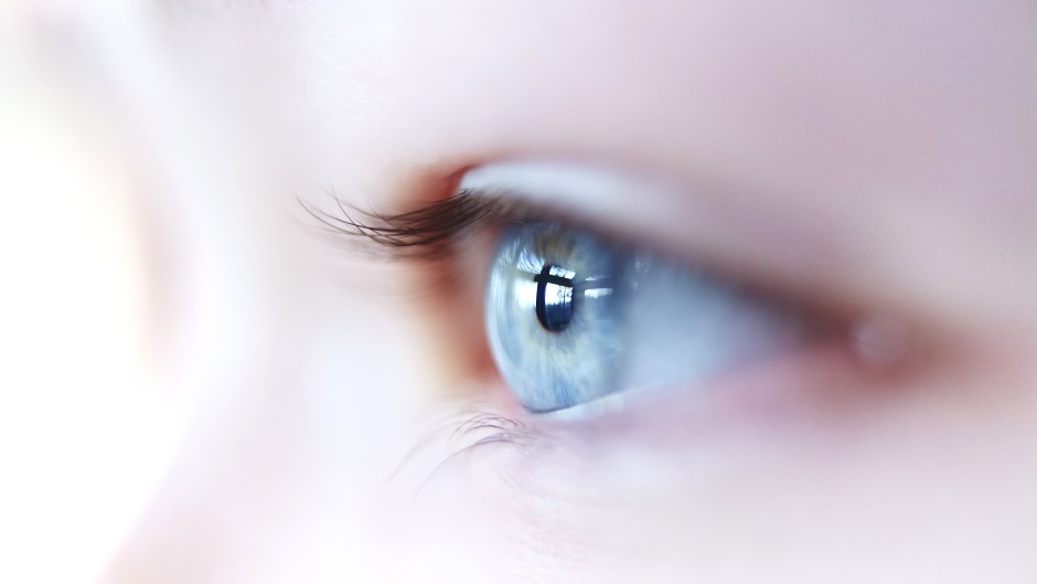 Illustration of a blue female eye.