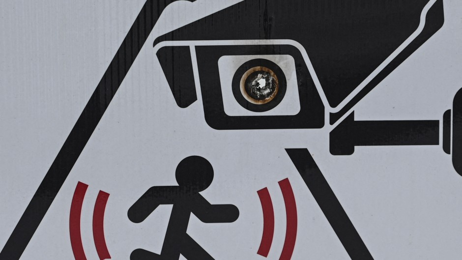 File: A CCTV in operation sign. Artur Widak/NurPhoto via AFP
