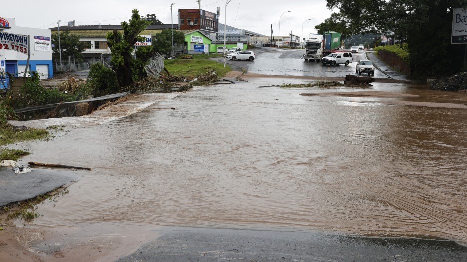 A general view of a flooded street following heavy rains in Pinetown. AFP/Phill Magakoe