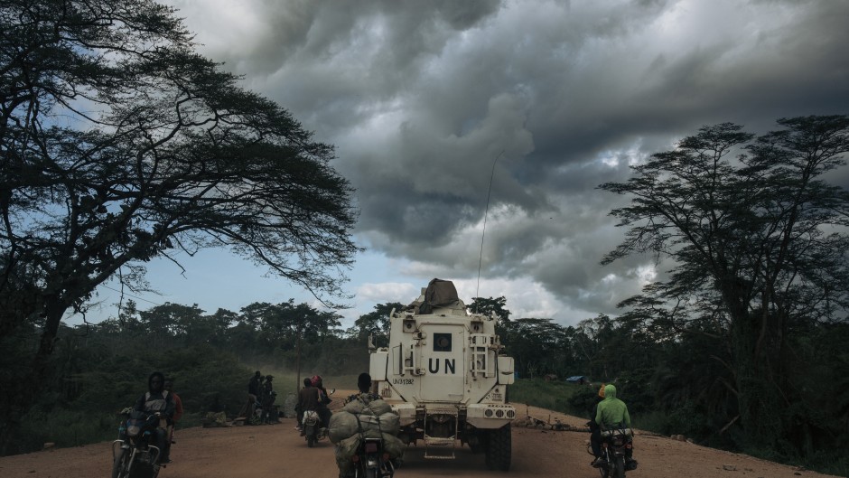 A MONUSCO armed vehicle drives along the Beni-Kasindi Road. AFP/Alexis Huguet