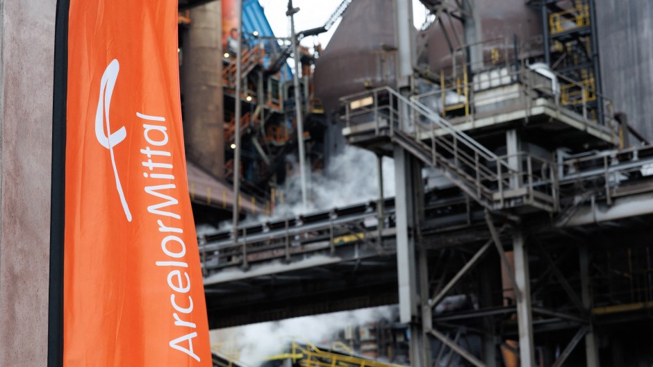 A banner with the logo of ArcelorMittal. AFP/Kurt Desplenter/BELGA