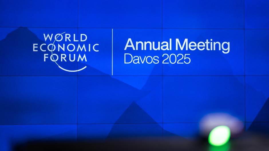 A sign of the World Economic Forum seen before the upcoming WEF annual meeting held in Davos. AFP/Fabrice Coffrini