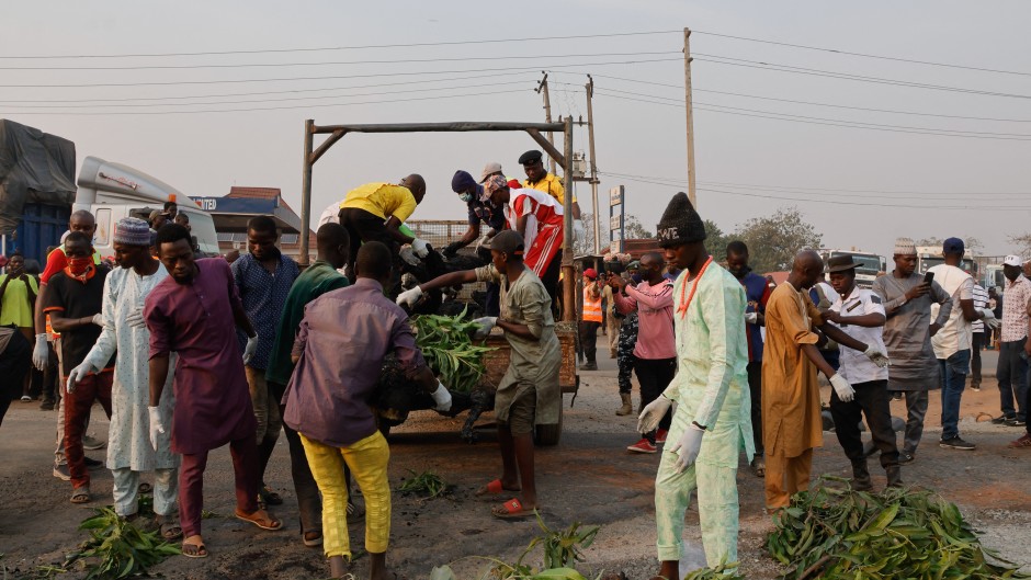 A rescue operation takes place at the petrol tanker explosion in Dikko. next24online/NurPhoto via AFP